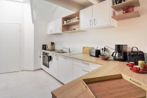 Køkken eller tekøkken på La Galerie Pornic - Maison Cedre