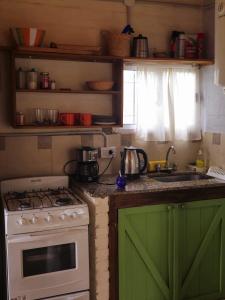 Η κουζίνα ή μικρή κουζίνα στο Cabaña Refugio De Caminantes