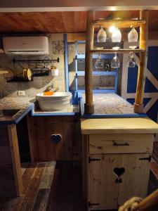 Kuchyň nebo kuchyňský kout v ubytování Home Stella