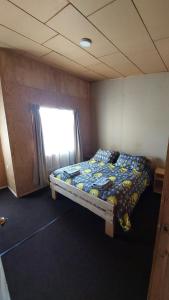 Postel nebo postele na pokoji v ubytování Departamento familiar