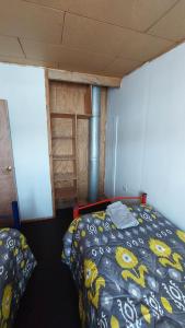 Postel nebo postele na pokoji v ubytování Departamento familiar