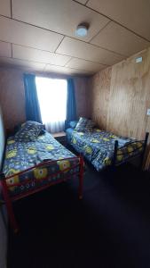 Postel nebo postele na pokoji v ubytování Departamento familiar