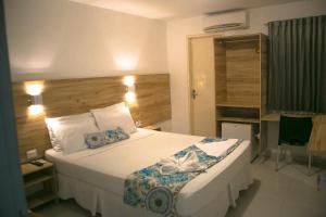 Postel nebo postele na pokoji v ubytování Hotel Refugio