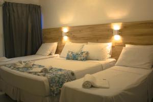Postel nebo postele na pokoji v ubytování Hotel Refugio