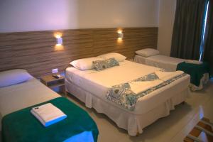 Postel nebo postele na pokoji v ubytování Hotel Refugio