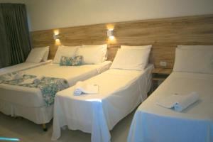 Postel nebo postele na pokoji v ubytování Hotel Refugio