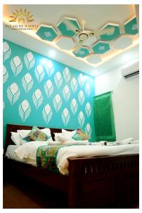 Ένα ή περισσότερα κρεβάτια σε δωμάτιο στο Hotel Pleasure Haveli