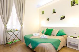 Postel nebo postele na pokoji v ubytování Gemme Di Roma Accomodation