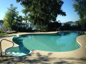 a large swimming pool in a yard at Elmhirst's Resort in Keene