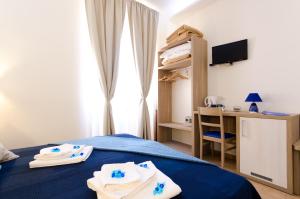 Postel nebo postele na pokoji v ubytování Gemme Di Roma Accomodation