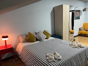 A bed or beds in a room at Aparment Puerta de sol
