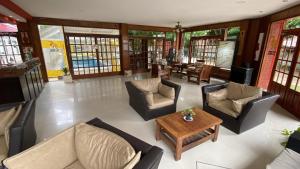 an overhead view of a living room with couches and a table at San Remo Palace Hotel in Villa Gesell