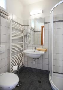 Koupelna v ubytování Hotel Iones