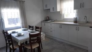 Η κουζίνα ή μικρή κουζίνα στο Bodrum Family Apartments