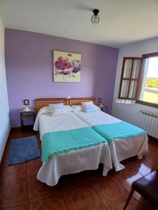 Postel nebo postele na pokoji v ubytování CA La Llosa Villahormes