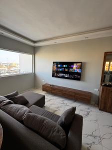 TV a/nebo společenská místnost v ubytování Seaside Serenity Apartment