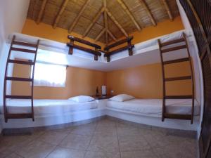 Cama o camas de una habitación en Guille Bungalows
