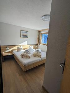 Posteľ alebo postele v izbe v ubytovaní Haus Schönjochl by Châtel Reizen