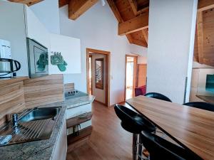 Televízia a/alebo spoločenská miestnosť v ubytovaní Haus Schönjochl by Châtel Reizen