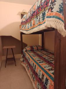 Postel nebo postele na pokoji v ubytování Waldhaus, la casa del bosque + 4 fotografie