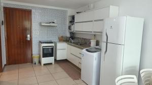 Η κουζίνα ή μικρή κουζίνα στο Flat Beira Mar em Manaíra - Aptos de 2 Quartos