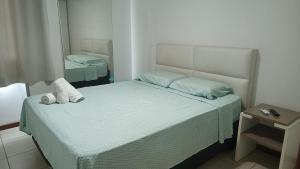 Ένα ή περισσότερα κρεβάτια σε δωμάτιο στο Flat Beira Mar em Manaíra - Aptos de 2 Quartos