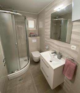 Kúpeľňa v ubytovaní Apartments Miroslava