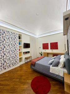 Ένα ή περισσότερα κρεβάτια σε δωμάτιο στο Duomo Leonardo31 Dimora di Charme +81 φωτογραφίες