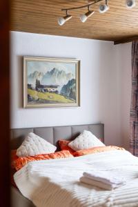 Letto o letti in una camera di Alpenblick Loft neben Skilift in Amden Arvenbüel