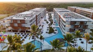 an aerial view of a resort with a swimming pool at Porto Alto Resort in Ipojuca