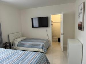 Кровать или кровати в номере Ocean front 1 bedroom in Tropical Paradise +12 фотографий