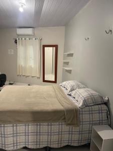 En eller flere senge i et værelse på Casa para alugar - Belém, Centro