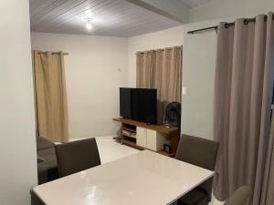 Et tv og/eller underholdning på Casa para alugar - Belém, Centro + 3 billeder