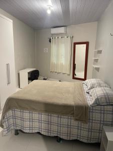 En eller flere senge i et værelse på Casa para alugar - Belém, Centro