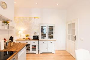 Кухня или мини-кухня в Apartment Fritz
