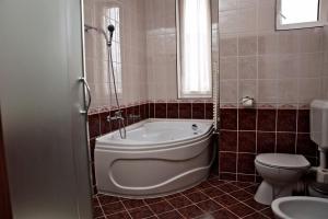 Kúpeľňa v ubytovaní Hotel Lukács Superior