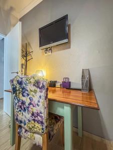 TV a/nebo společenská místnost v ubytování Estrela Comfortable Home