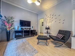 TV a/nebo společenská místnost v ubytování Estrela Comfortable Home