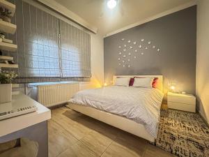 Postel nebo postele na pokoji v ubytování Estrela Comfortable Home