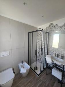 Koupelna v ubytování Albergo Sappia + 37 fotografií