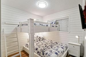 Ένα ή περισσότερα κρεβάτια σε δωμάτιο στο Carolina Beach Club 525 +50 φωτογραφίες