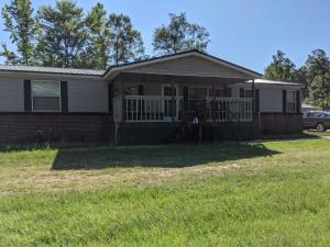 a house with a front porch and a yard at Clayhills in Sallis