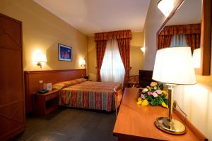 Postel nebo postele na pokoji v ubytování TH Cinisi - Florio Park Hotel