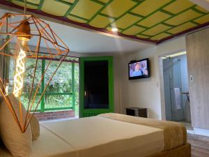 Postel nebo postele na pokoji v ubytování Dreams Hotel y Restaurante