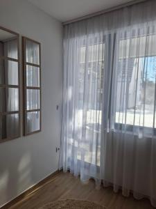 سرير أو أسرّة في غرفة في Apartman Silvija 2 Divčibare