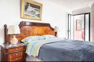 Letto o letti in una camera di Suite Lili