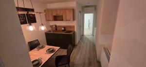 Kuchyň nebo kuchyňský kout v ubytování Apartma Minka