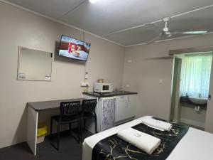 Kuchyň nebo kuchyňský kout v ubytování Kalua Motel
