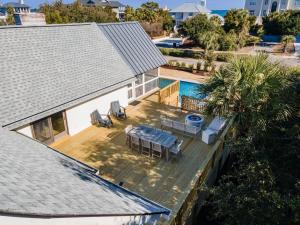 an aerial view of a house with a deck and a pool at High Seas in DeBordieu Colony home by Peace Vacations in Georgetown