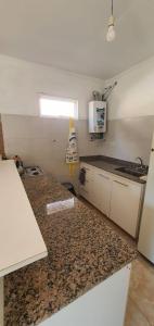 Η κουζίνα ή μικρή κουζίνα στο Casa Martina